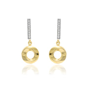 pendientes largos con caida circonitas y motivo circular en oro amarillo y blanco