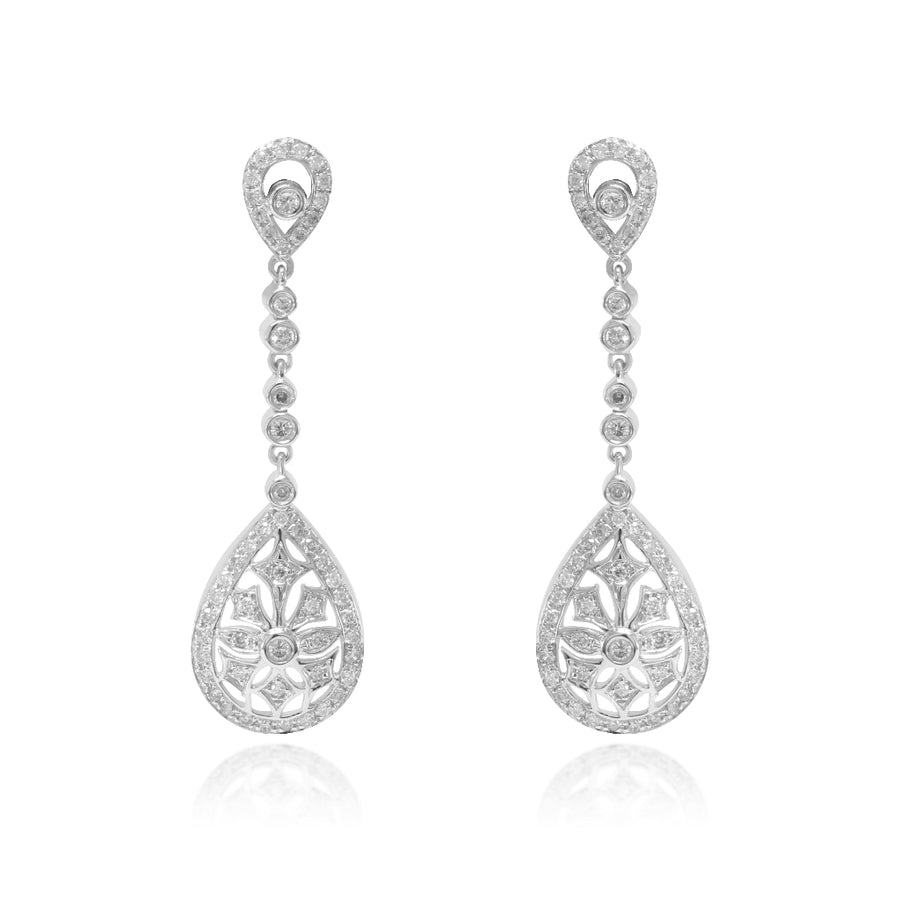 Pendientes largos realizados en oro blanco de 18k y diamantes