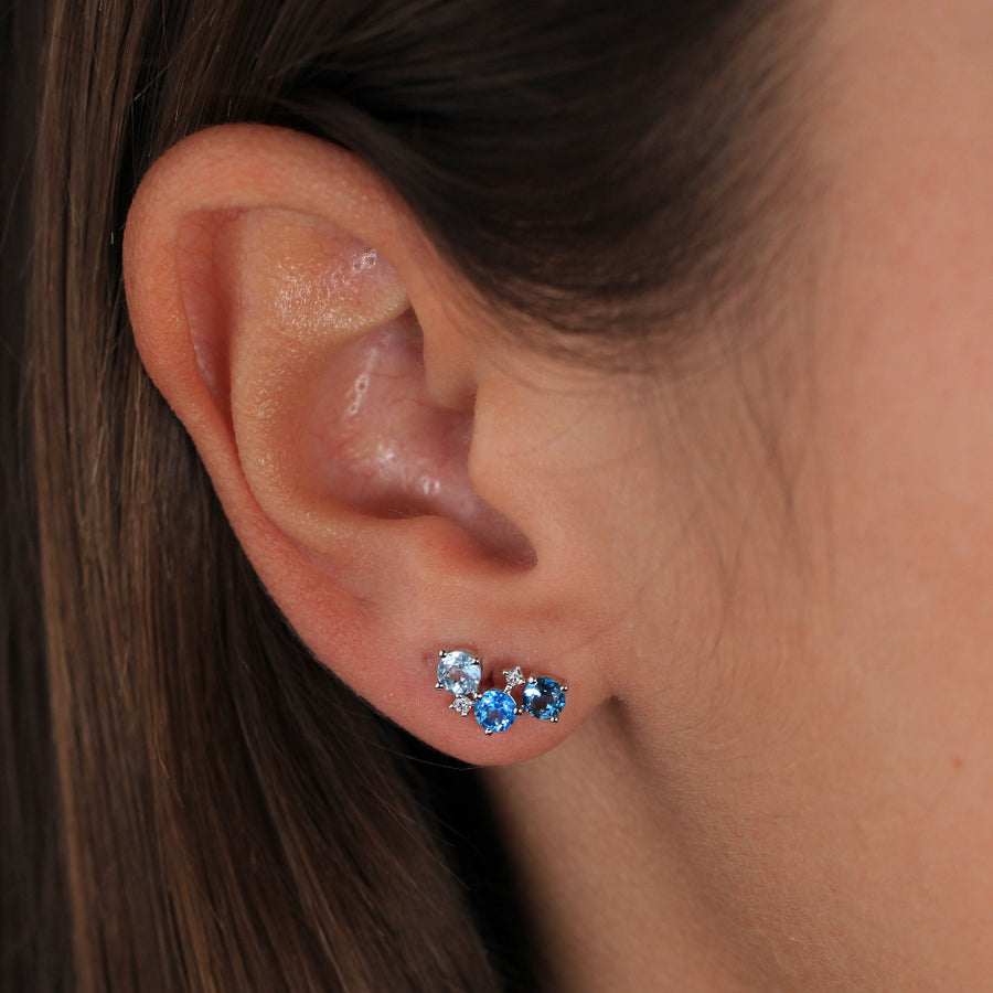 Pendientes de oro blanco de 18k con topacios azules y diamnates