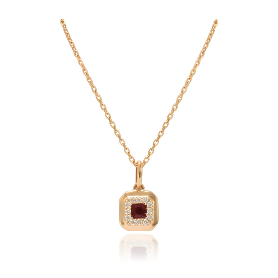 Collar realizado en oro rosa de 18 quilates con un colgante con un rubí y diamantes. Joyería Pamplona