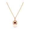 Collar realizado en oro rosa de 18 quilates con un colgante con un rubí y diamantes. Joyería Pamplona