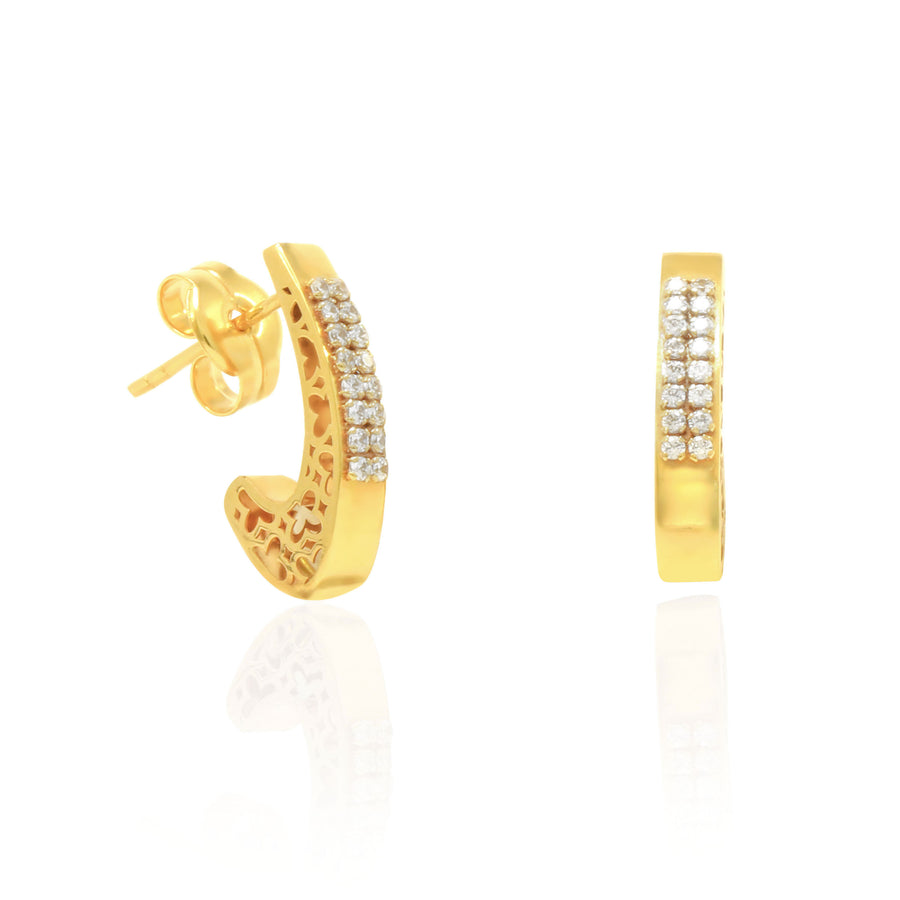 Pendientes en oro amarillo de 18 quilates. Medio aro engarzado 32 circonitas en total.
