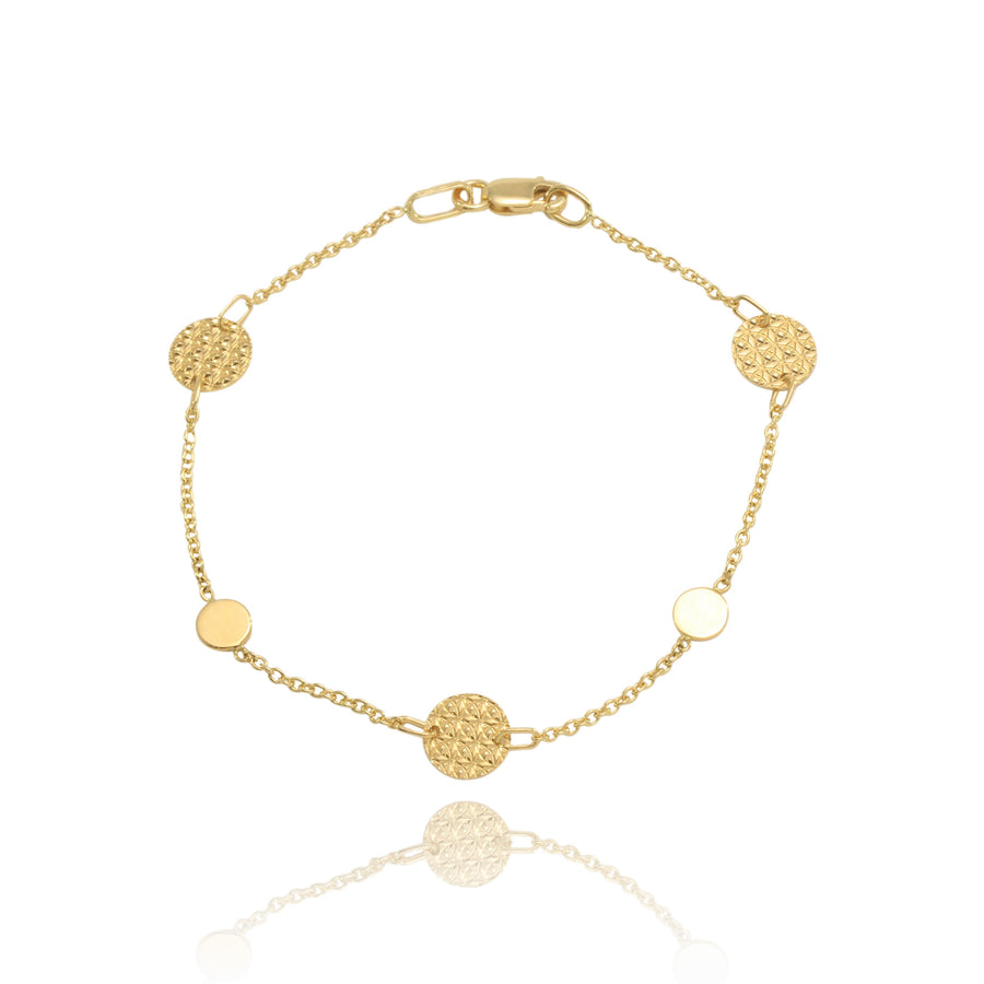 Pulsera de oro amarillo de 18 quilates. Motivos circulares.