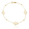 Pulsera en oro amarillo de 18 quilates con tres manos de Fátima.