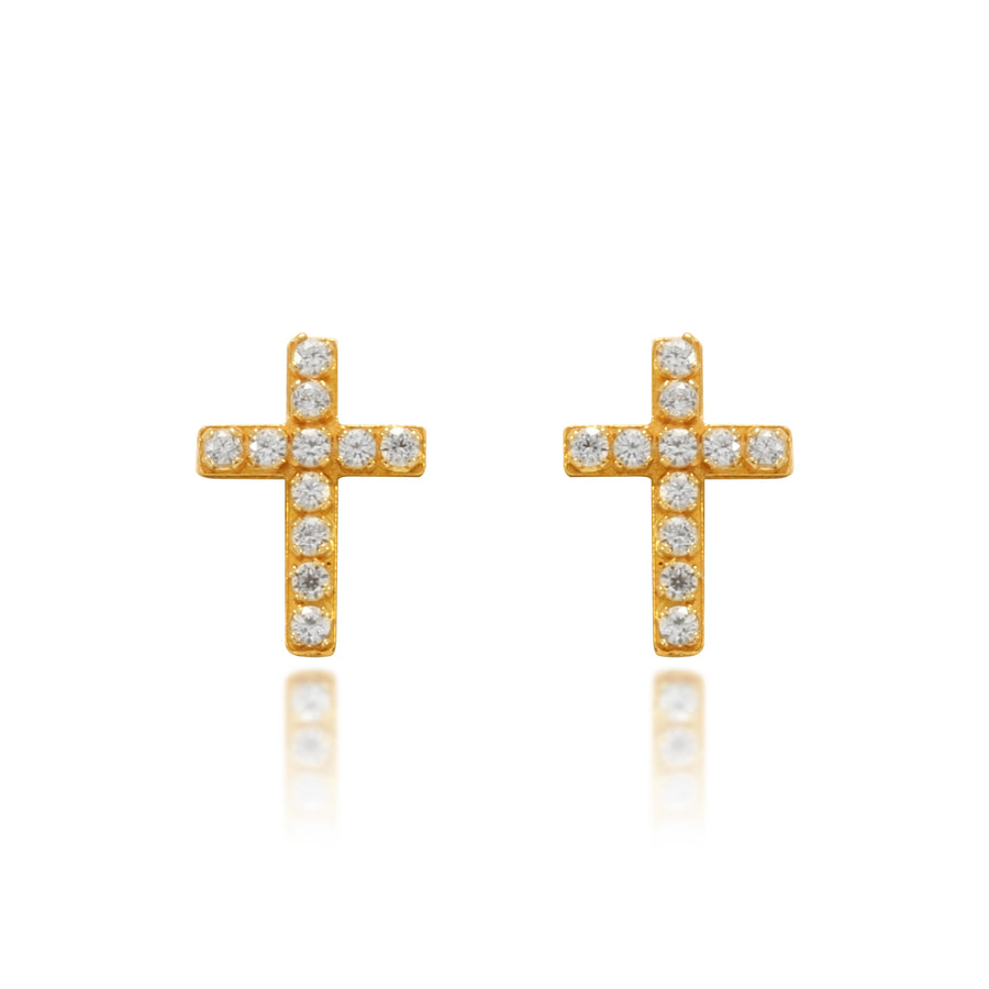 Pendientes de cruz realizados en oro amarillo de 18 quilates y cuajados en circonitas.