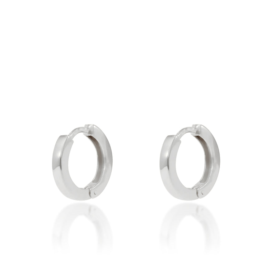 Pendientes en forma de aro de oro blanco 18 quilates.