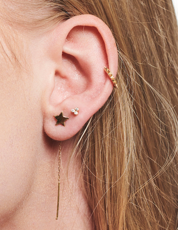 Curved star earrings