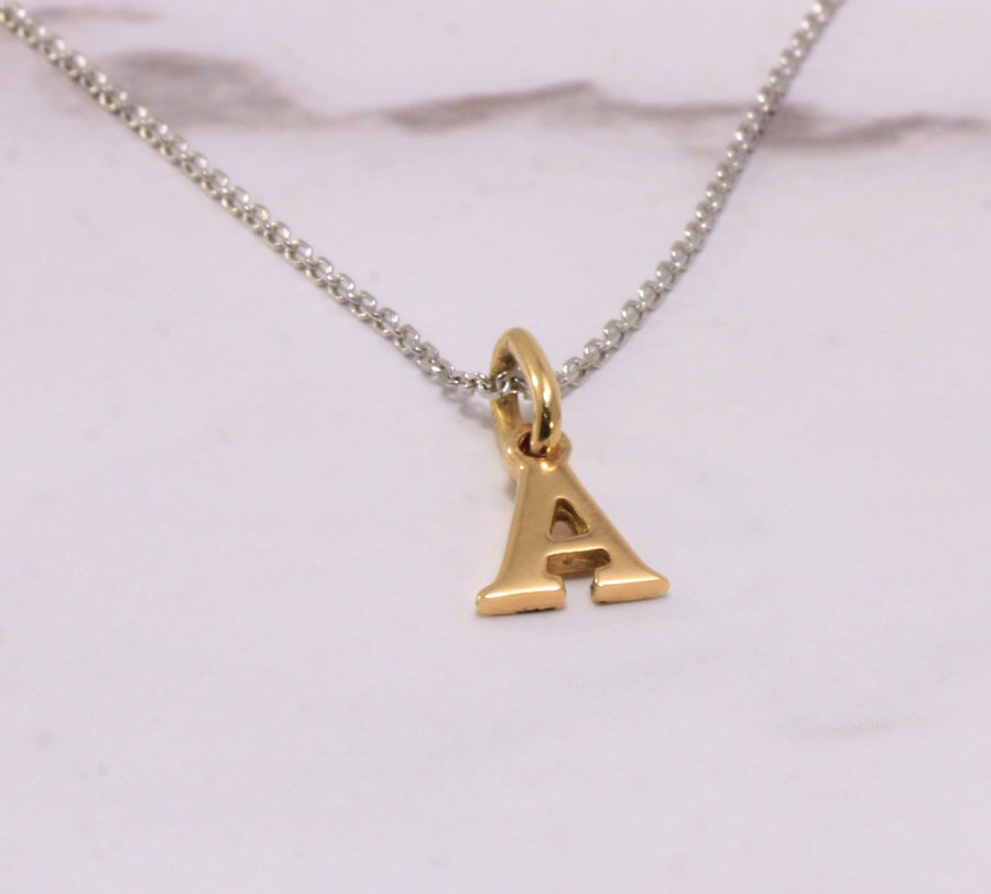 Two-tone initial necklace