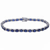 Pulsera riviere de oro blanco de 18 quilates con 28 zafiros y 58 diamantes alternados engastados en garras. El peso total de los diamantes es 0,42cts. 